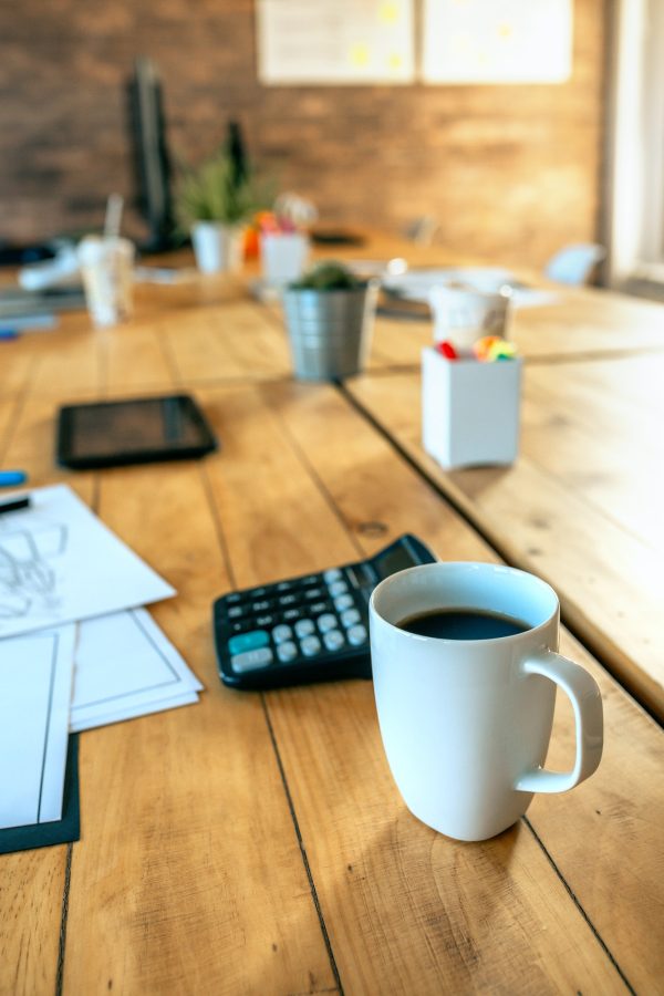 Coffee cup detail on office table